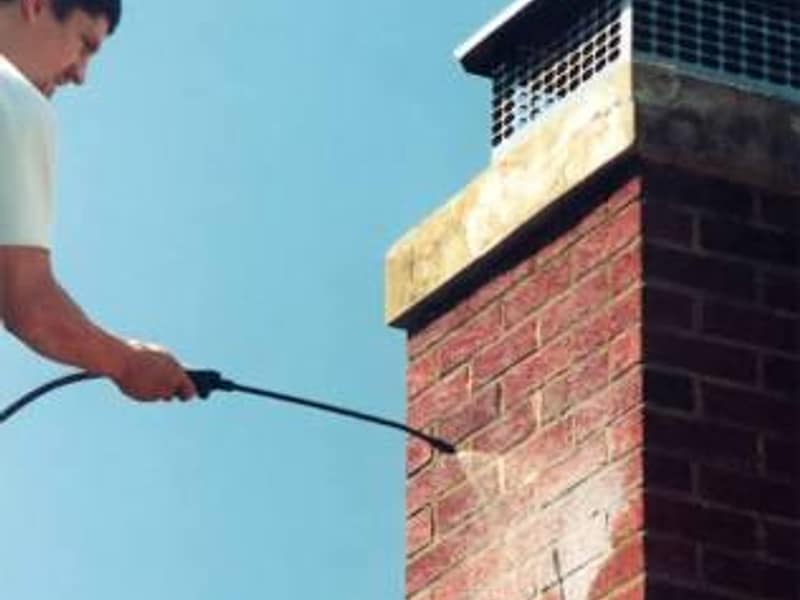 repellent sprayed across the brick face on a chimney in Toms River, NJ